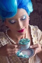 Baroque woman enjoying her tea Royalty Free Stock Photo