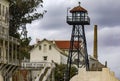 Barracks and guardhouse with its watchtower of the federal prison of Alcatraz Island of the United States in the bay.