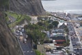 Barranco coast with Pacific Ocean beach with the historic restaurant - Rosa Nautica - and a highway with traffic Royalty Free Stock Photo