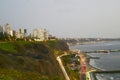 Barranco Peru coast with Pacific Ocean beach with the historic restaurant - Rosa Nautica - and a highway with traffic