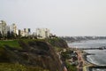 Barranco Peru coast with Pacific Ocean beach with the historic restaurant - Rosa Nautica - and a highway with traffic Royalty Free Stock Photo