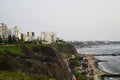 Barranco Peru coast with Pacific Ocean beach with the historic restaurant - Rosa Nautica - and a highway with traffic