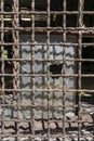 Barred window - broken glass - closeup Royalty Free Stock Photo