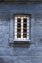 Barred window on an old brick building Royalty Free Stock Photo