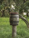 Barrel in an apple tree farm Royalty Free Stock Photo