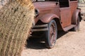 Barrel Cactus and a rusty classic car Royalty Free Stock Photo