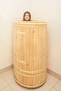 Barrel cedar. Wellness spa sauna. Aromatherapy treatment. Young beauty woman. Girl face