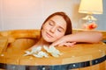 Barrel cedar. Wellness spa sauna. Aromatherapy treatment. Young beauty woman. Girl face