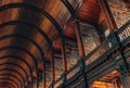 Barrel ceiling and books gallery inside Long Room in Old Library , Trinity Colege, Dublin, Ireland.