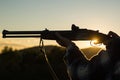 Barrel of a gun. Hunter with Rifle with Scope. Hunter with shotgun gun on hunt. Close up hunter hunting. Hunter man with Royalty Free Stock Photo