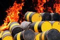 Barrel oil, pile of old barrel oil gas tank metal and background fire flare flame bonfire