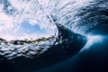 Barrel wave underwater with air bubbles. Royalty Free Stock Photo