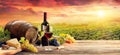 Barrel Wineglasses Cheese And Bottle In Vineyard Royalty Free Stock Photo