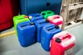 Barrels with chemicals in a chemical warehouse, colored containers