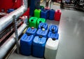 Barrels with chemicals in a chemical warehouse, colored containers