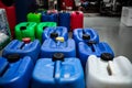 Barrels with chemicals in a chemical warehouse, colored containers