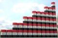 Barrels with flag of Egypt form rising chart or upwards trend. Oil industry success concept, 3D rendering