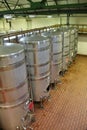 Barrels and technical equipment inside a wine cellar in Constantia, Cape Town, South Africa. Royalty Free Stock Photo