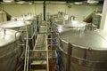 Barrels and technical equipment inside a wine cellar in Constantia, Cape Town, South Africa. Royalty Free Stock Photo