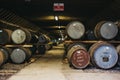 Barrels of whisky inside Brora Distillery warehouse in Scotland, rare Brora whisky in the front.