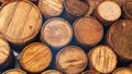 Barrels of wine in the cellar. Oak barrels for cognac storage close-up. Production of cognac in the old way. Aging alcoholic Royalty Free Stock Photo