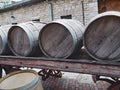 Barrels for wine on an on old wooden wagon Royalty Free Stock Photo