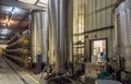 Barrels of wine in winery cellar Royalty Free Stock Photo