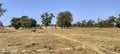 Barren land under blue sky