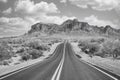 Barren road stretches out in an empty landscape