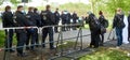 Barricade with a group of police officers separating the demonstrators from the -visitors of the AFD party conference