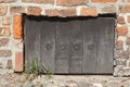 Barricaded old cellar window Royalty Free Stock Photo