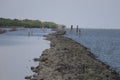 The barrier against landslides, sea water erodes the ground, a long way of rocks.