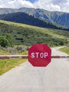 Barrier with STOP road sign - Movement without stopping is prohibited Royalty Free Stock Photo