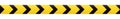 Barrier tape. Construction border. Black and yellow restriction line. Do not cross boundary tape.