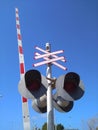 Barrier and traffic light at a railway crossing in Haifa in Israel close-up. Royalty Free Stock Photo