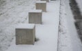 Barriers made of concrete cubes size 50 cm. serves as a barrier to the entrance to the park and the pedestrian zone. whole cubes a