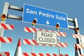 Barriers at San Pedro Sula city traffic sign. Lockdown in Honduras conceptual 3D rendering