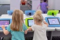 Barrington, IL/USA - 07-08-2019: Young kids playing educational games on the computers at the public library