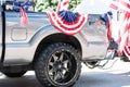 Barrington, Illinois/USA Ã¢â¬â July, 4 2019: Silver Ford F-150 FX4 pickup track decorated with stars and stipes for the hometown