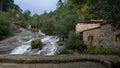 Barroso waterfall with water mill, Pontevedra, Galicia, Spain Royalty Free Stock Photo