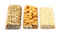 Bars with peanuts, sesame and sunflower seeds isolated. Royalty Free Stock Photo