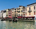 Bars, restaurants and gondolas, on the banks of the Grand Canal in Venice.