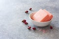 Bars of rose soap and dry rose flowers