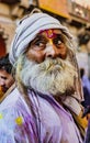 Barsana, India - February 23, 2018 - Old man with grey beard looks camera-left in Holi festival Royalty Free Stock Photo