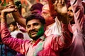 Young men dance during Holi Festival in India