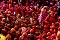 Barsana, Uttar Pradesh, India February 6 2021: People of Barsana Mathura playing holi and are covered in holi colors during holi Royalty Free Stock Photo