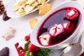 A Barszcz beetroot soup with small pierogi Royalty Free Stock Photo