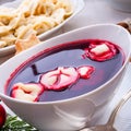 Barszcz beetroot soup with small pierogi Royalty Free Stock Photo