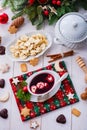 A Barszcz beetroot soup with small pierogi