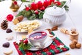 A Barszcz beetroot soup with small pierogi